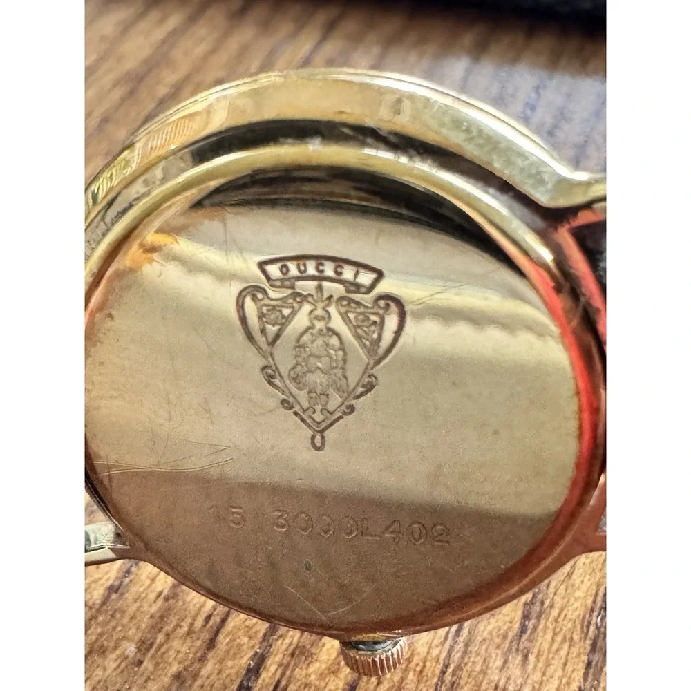Gucci 3000 L Gold Plated Ladies Watch Black Dial Roman Bezel